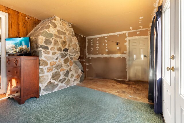 2700 Bristol Rd, Bristol, ME 04554 - unfurnished bedroom featuring carpet flooring and wooden walls