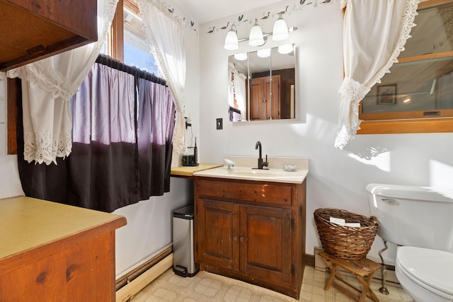 2700 Bristol Rd, Bristol, ME 04554 - bathroom featuring vanity, tile patterned floors, and a baseboard radiator