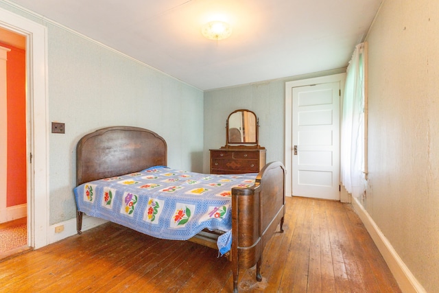 bedroom featuring hardwood / wood-style flooring