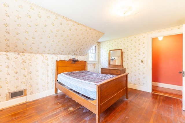 bedroom featuring dark wood-type flooring