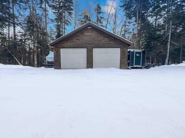11 Crows Rd, Greenville, ME 04441 - snow covered garage with a garage