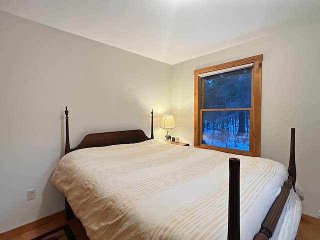 11 Crows Rd, Greenville, ME 04441 - bedroom with baseboards and wood finished floors