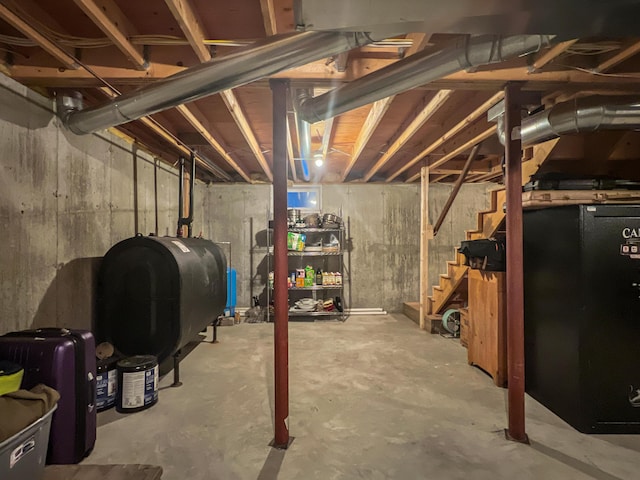 11 Crows Rd, Greenville, ME 04441 - unfinished basement with heating fuel and stairway