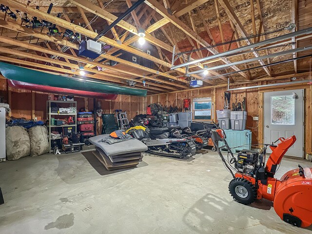 11 Crows Rd, Greenville, ME 04441 - garage featuring a garage door opener