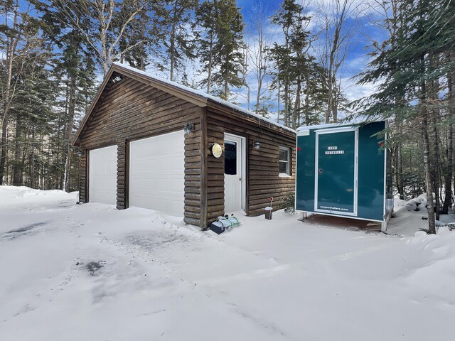11 Crows Rd, Greenville, ME 04441 - snow covered garage featuring a detached garage