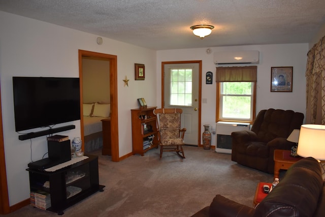 carpeted living room with a textured ceiling, heating unit, and a wall unit AC