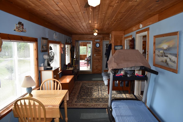 dining area with a healthy amount of sunlight and wood ceiling