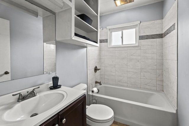 full bathroom with vanity, toilet, and tiled shower / bath combo