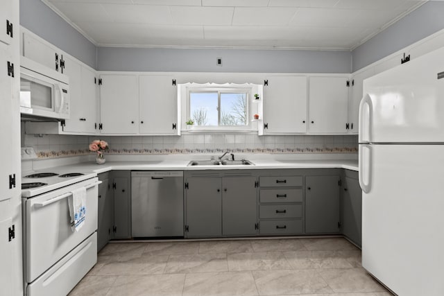 kitchen with gray cabinetry, sink, white appliances, decorative backsplash, and white cabinets