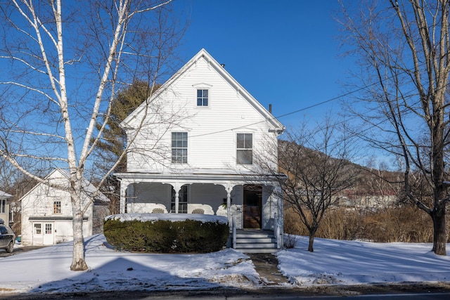 view of front property with covered porch