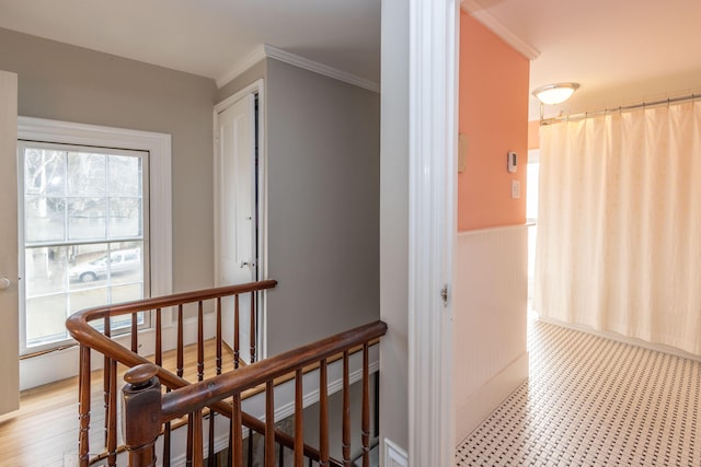 hallway featuring crown molding