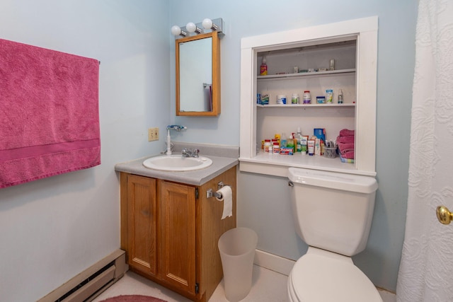 bathroom with vanity, a baseboard radiator, and toilet