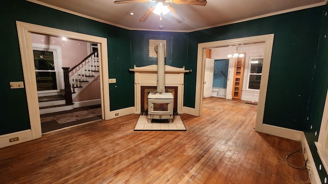 bedroom with a chandelier, hardwood / wood-style floors, and ornamental molding