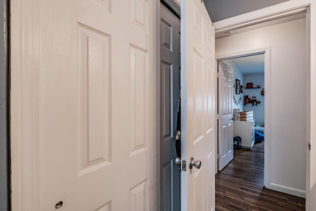 hallway featuring dark hardwood / wood-style floors