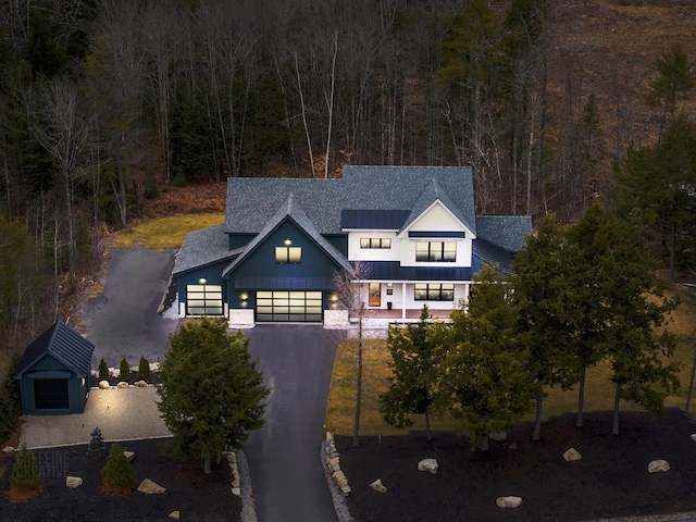 modern farmhouse featuring a garage