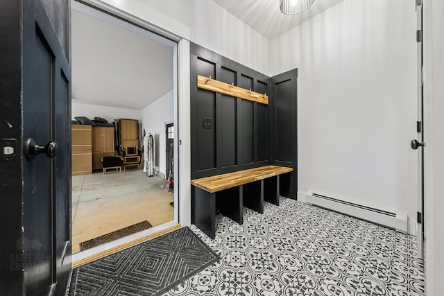 mudroom with a baseboard heating unit