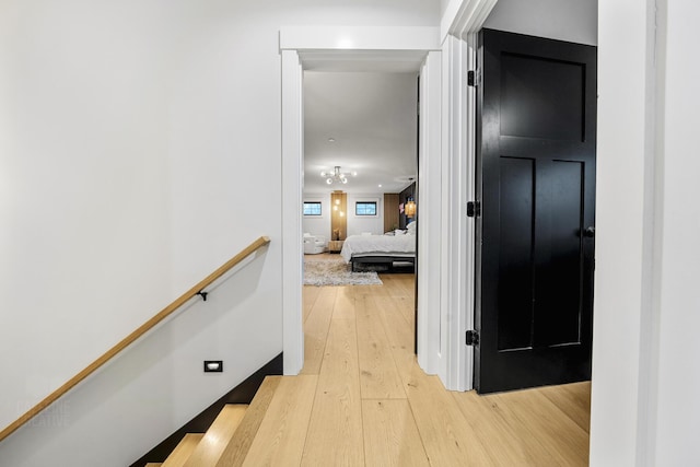 hallway featuring light wood-type flooring