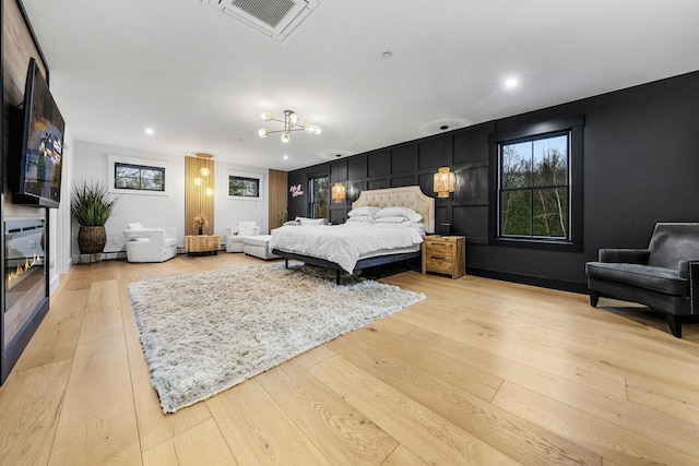 bedroom with light wood-type flooring