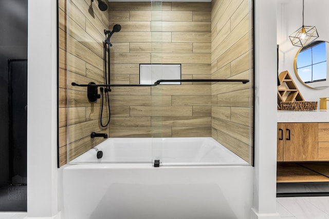 bathroom featuring tiled shower / bath combo