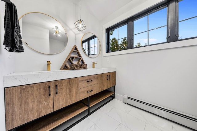 bathroom featuring vanity and a baseboard heating unit