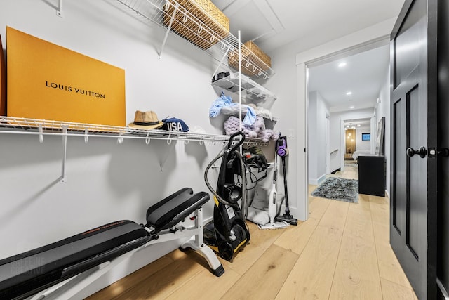 workout room with wood-type flooring