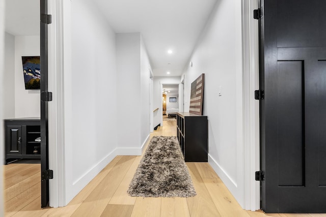 corridor featuring light wood-type flooring