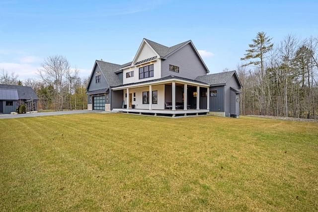 view of front of property featuring covered porch and a front yard