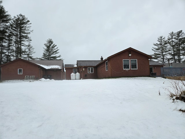 view of snow covered house