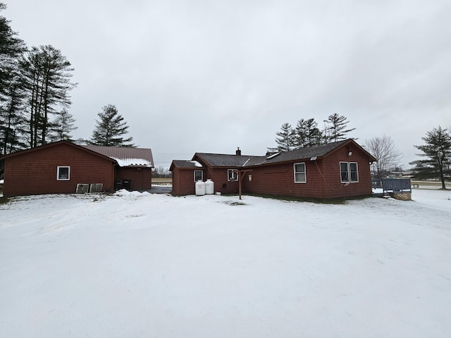 view of snow covered property