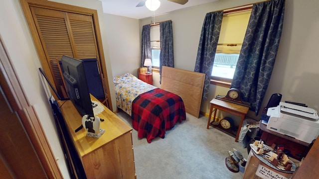 893 Horseback Rd, Levant, ME 04456 - bedroom with carpet, a closet, and a ceiling fan