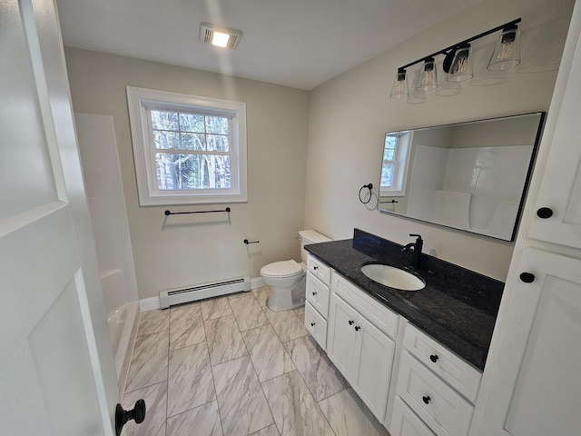 bathroom featuring vanity, toilet, a shower, and a baseboard radiator