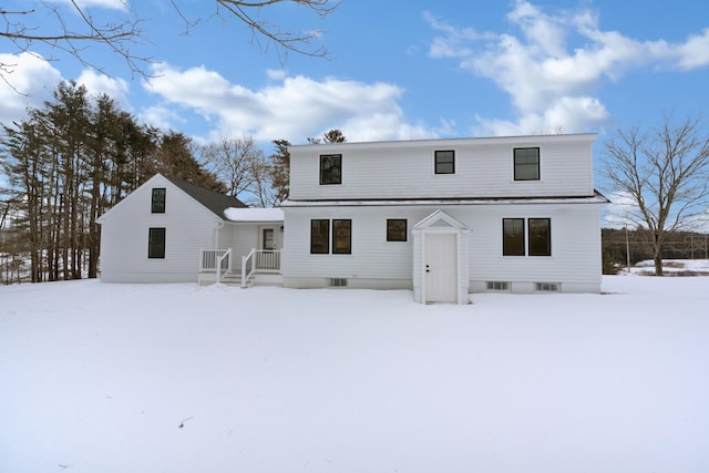 view of snow covered property