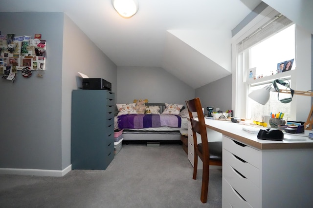 carpeted bedroom featuring vaulted ceiling