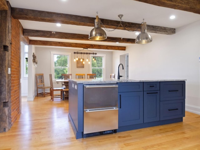 102 Main St, Belgrade, ME 04917 - kitchen featuring dishwasher, blue cabinets, light hardwood / wood-style floors, decorative light fixtures, and beam ceiling