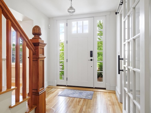 102 Main St, Belgrade, ME 04917 - foyer with light hardwood / wood-style flooring