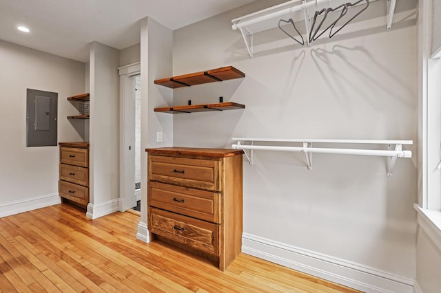 102 Main St, Belgrade, ME 04917 - walk in closet featuring electric panel and light hardwood / wood-style flooring