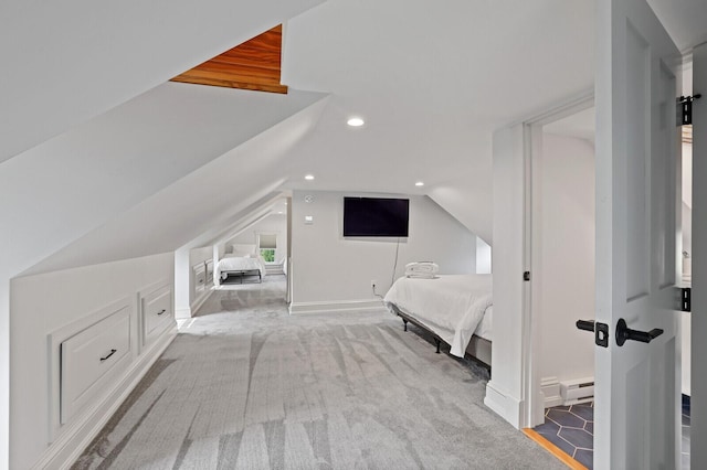 102 Main St, Belgrade, ME 04917 - unfurnished bedroom featuring light carpet, vaulted ceiling, and baseboard heating