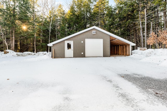 view of snow covered garage