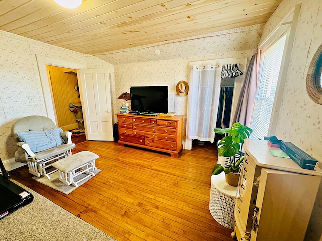 living room featuring wood ceiling