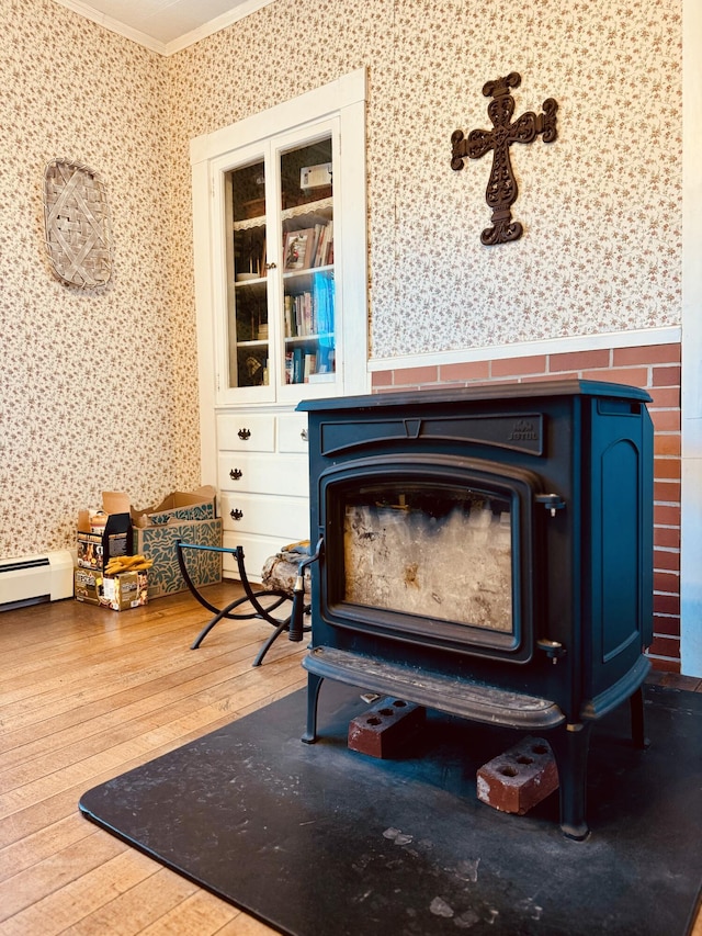 room details featuring crown molding and hardwood / wood-style floors