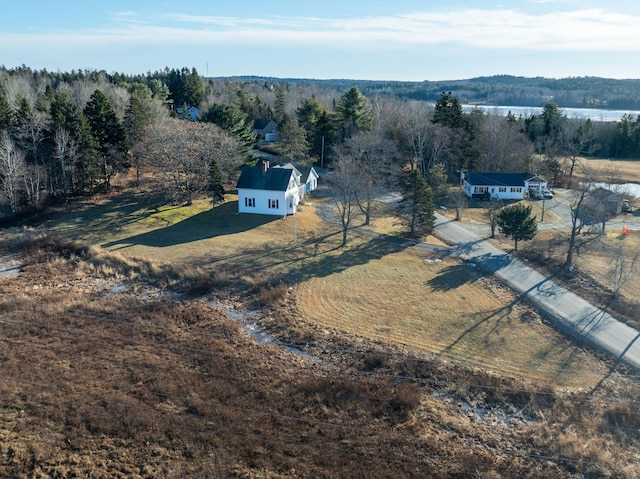 birds eye view of property with a rural view