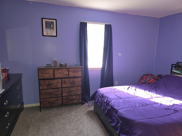 bedroom with light carpet