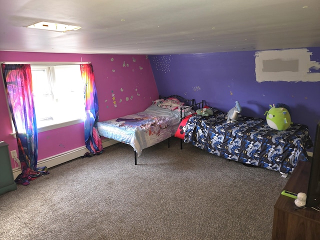 bedroom with carpet flooring and a baseboard radiator