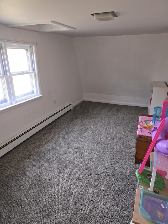 interior space with carpet floors and a baseboard radiator