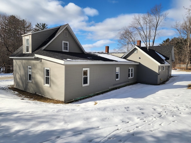 view of snow covered property