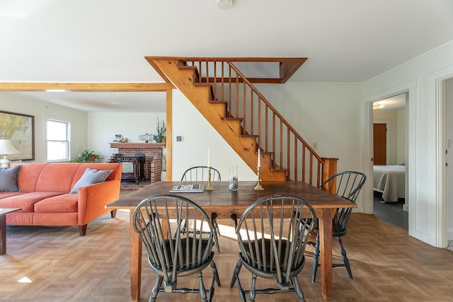 dining area with parquet floors