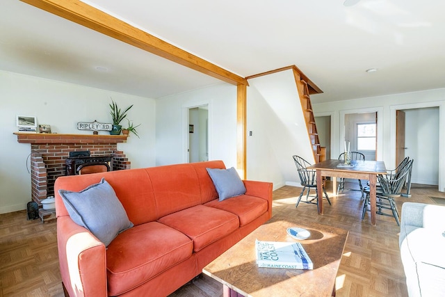 living room featuring beam ceiling and parquet floors