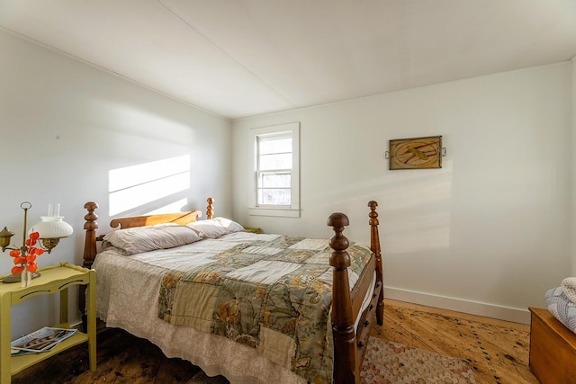 bedroom featuring wood-type flooring