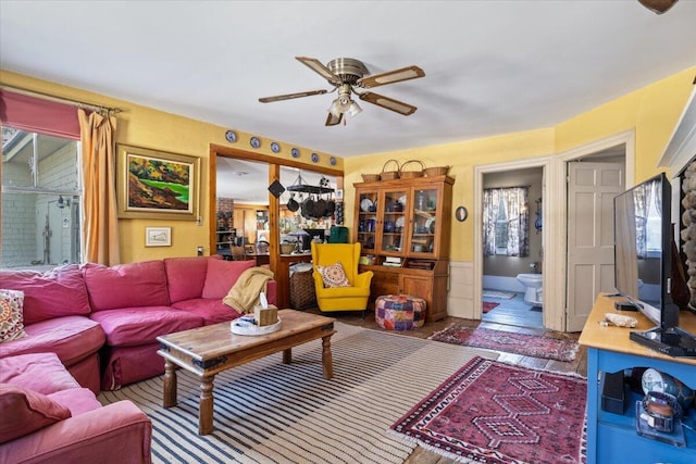 living room featuring ceiling fan