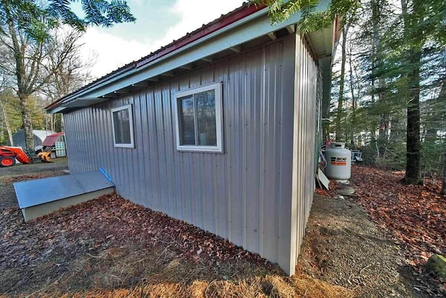 view of property exterior with metal roof